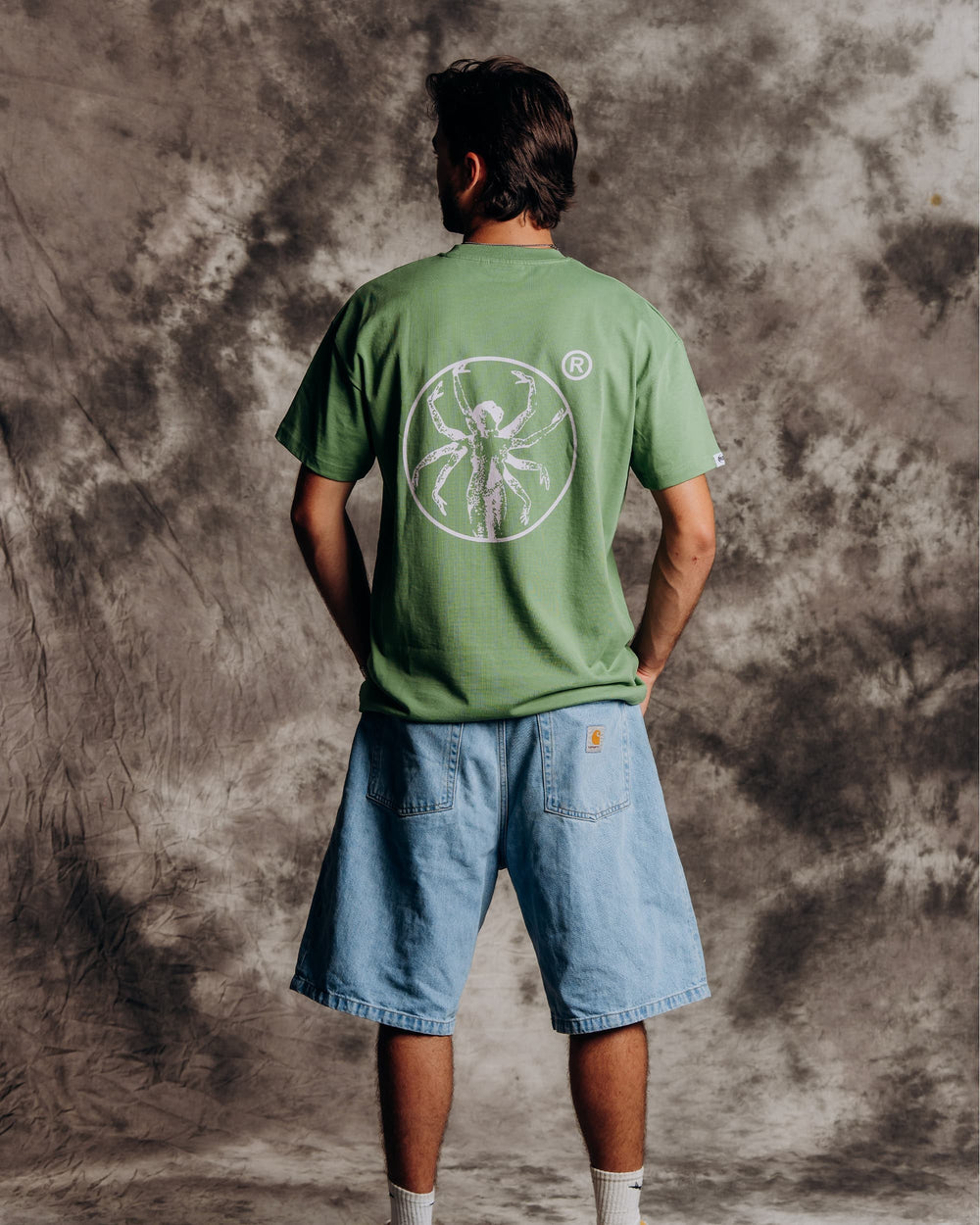 Oversized green graphic t-shirt model back view