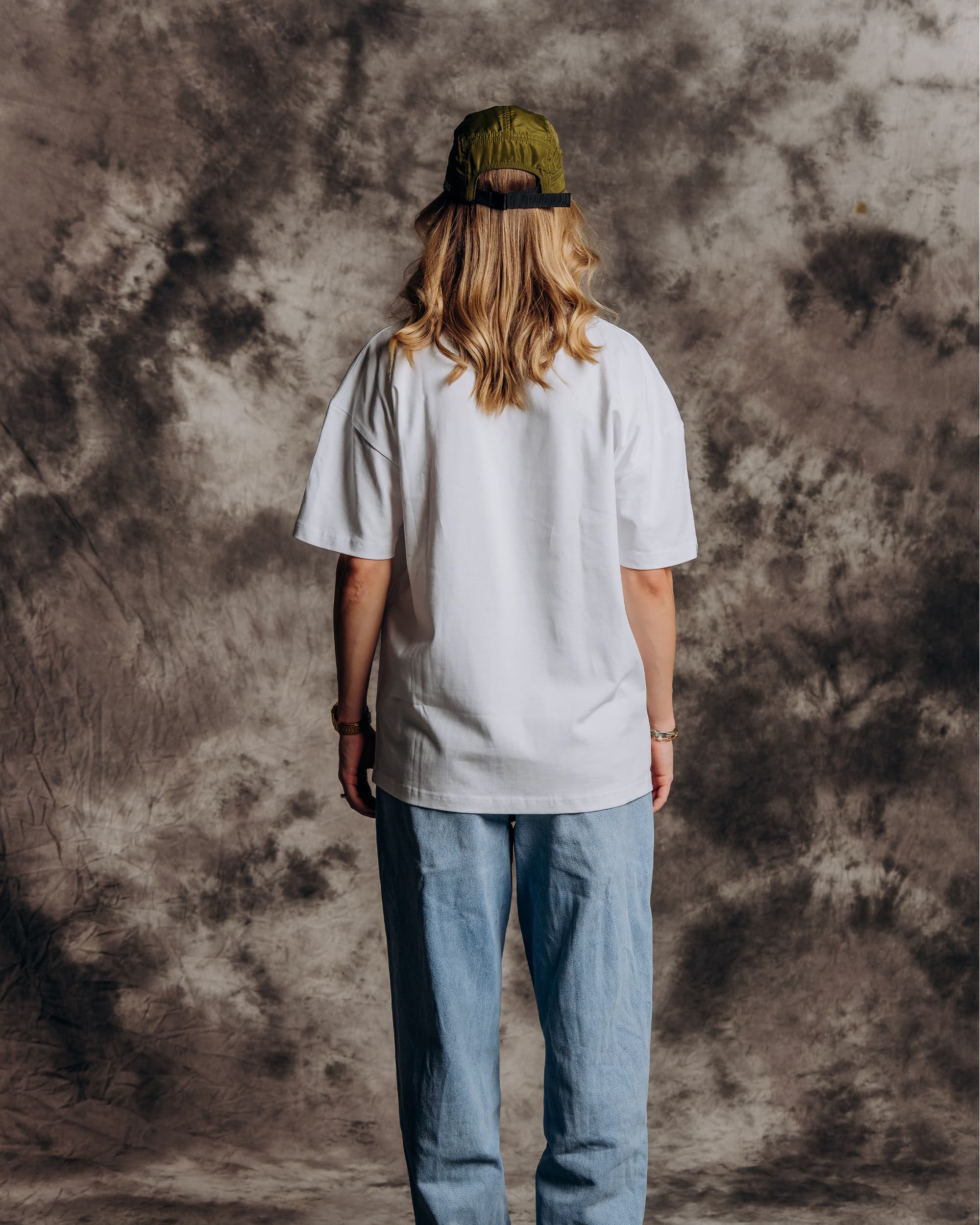 Oversized white graphic t-shirt model back view