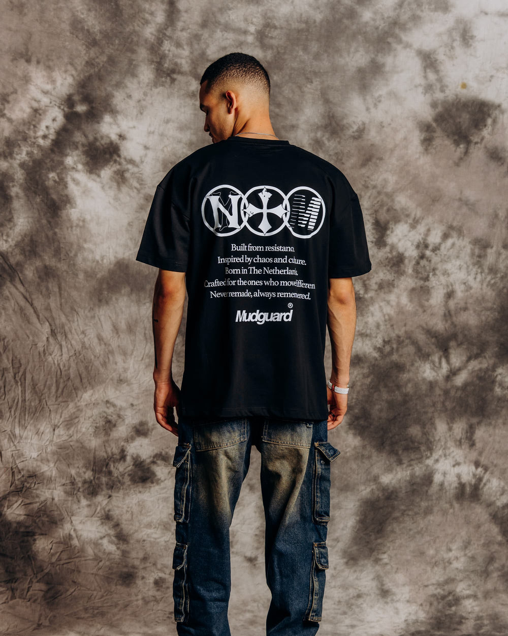 Oversized black t-shirt model back view