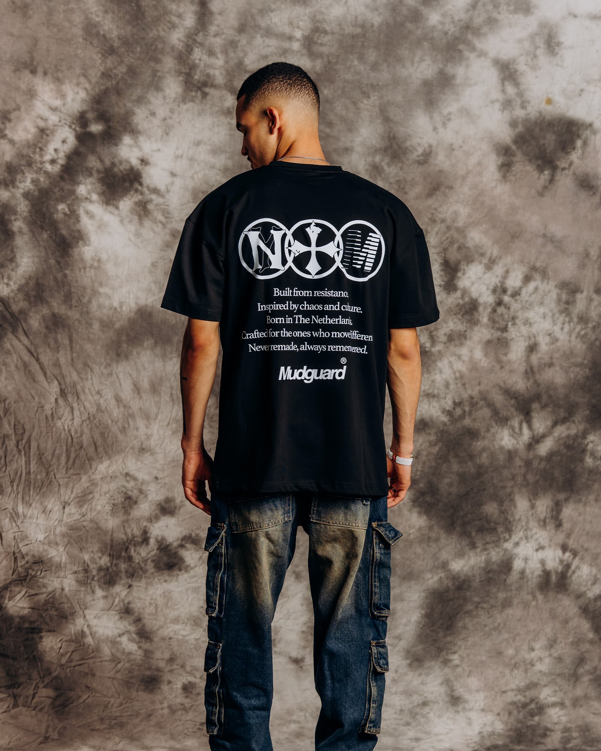 Oversized black t-shirt model back view