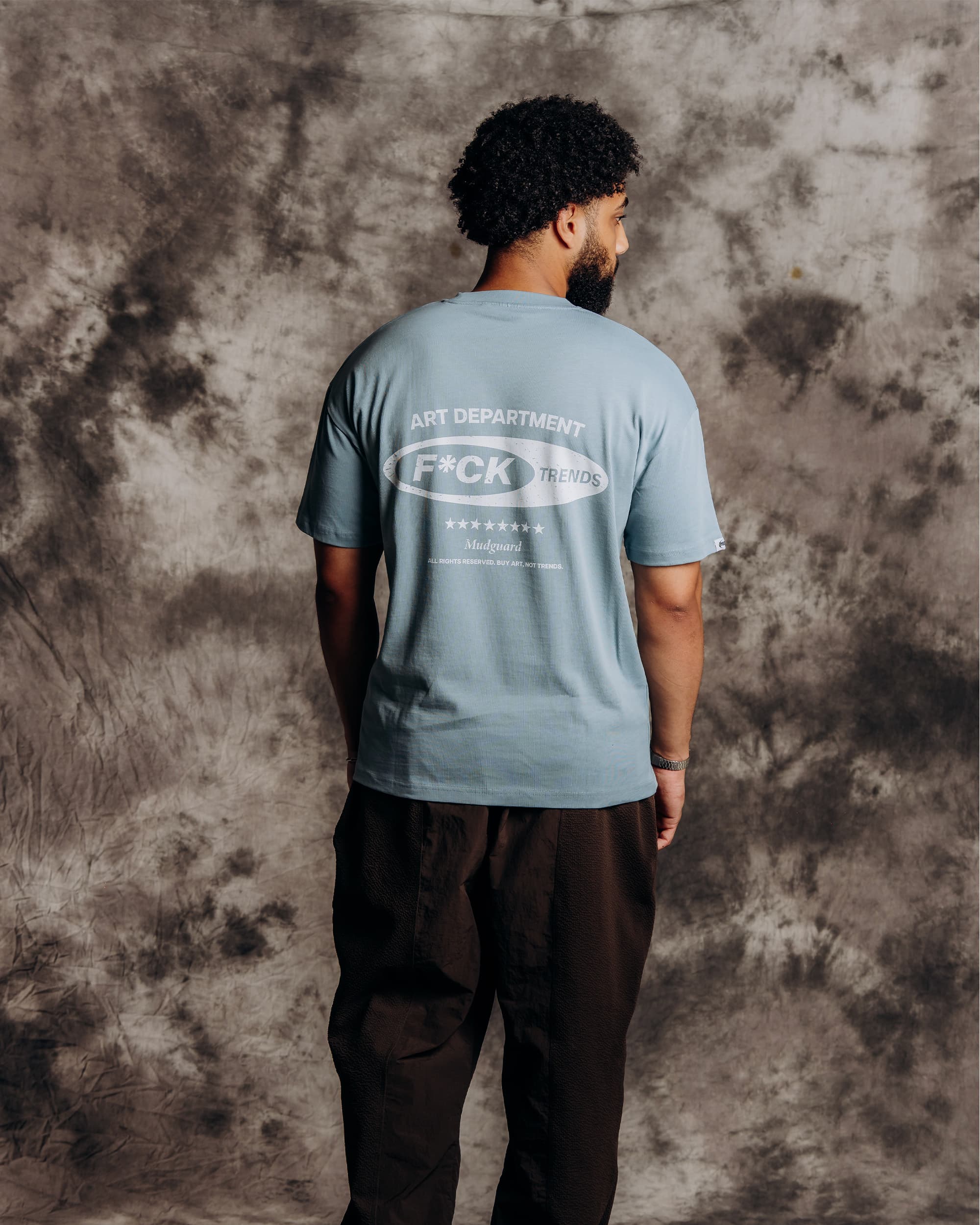 Oversized stone grey graphic t-shirt model back view